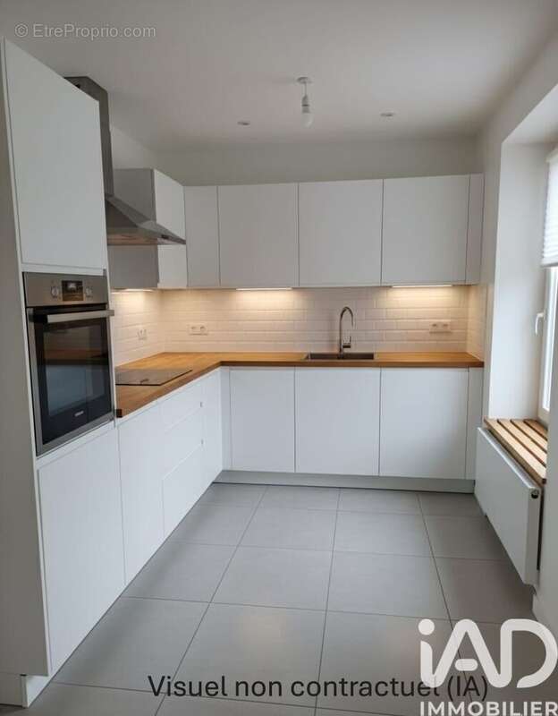 Maison 135 m² à Coulommiers-La-Tour  - photo 7