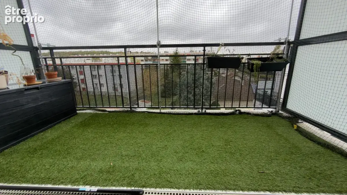 Immeuble de standing F2 avec extérieur et parking - photo 4