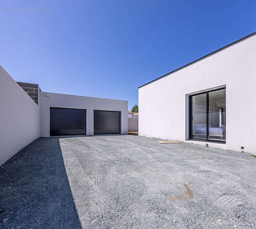 Maison récente de plain pied - photo 18