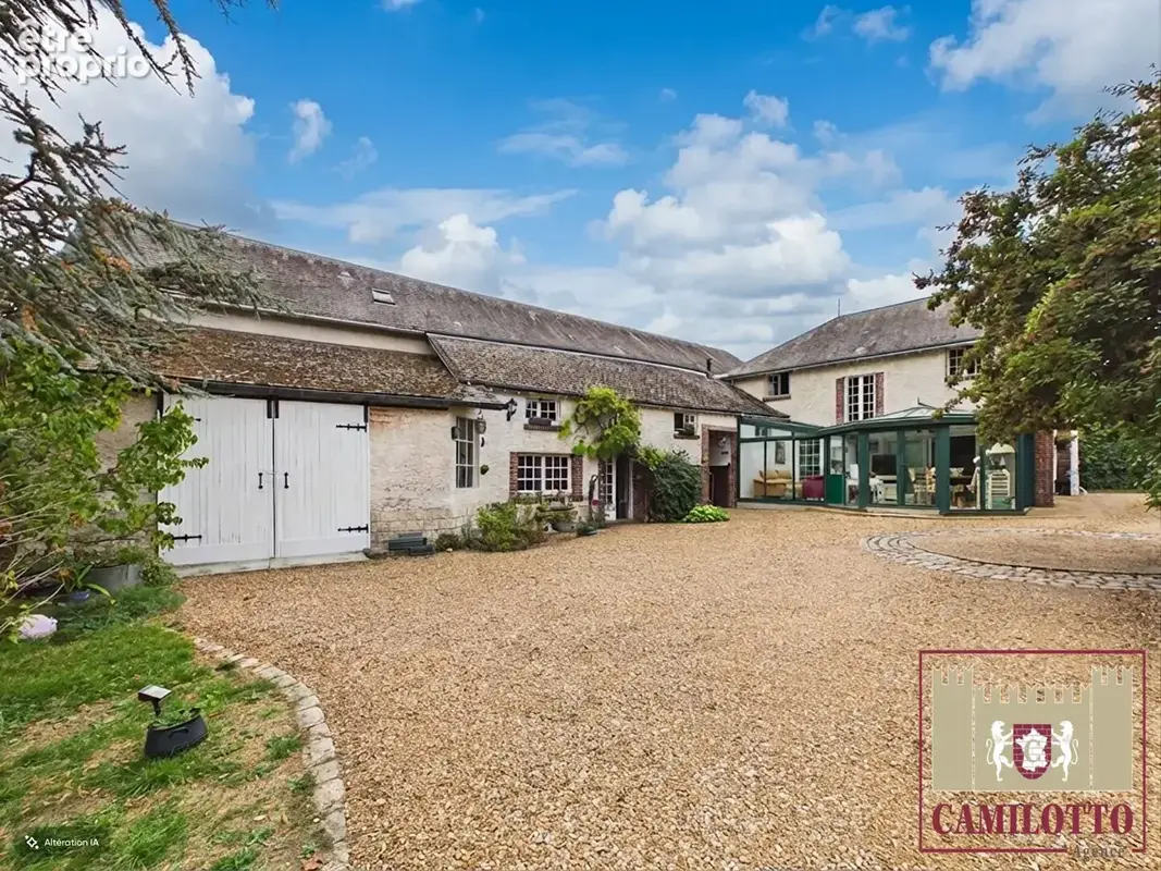 Propriété ancienne sur un terrain de 2800 m² - photo 18