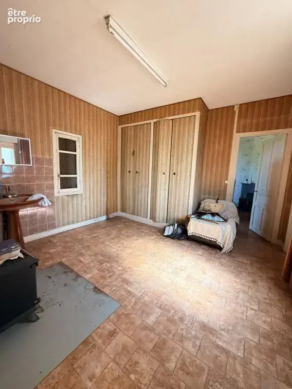 EN EXCLUSIVITE ! Maison en pierre de 136m², 2 garages sur terrain de 950m² 71 500 € - photo 8