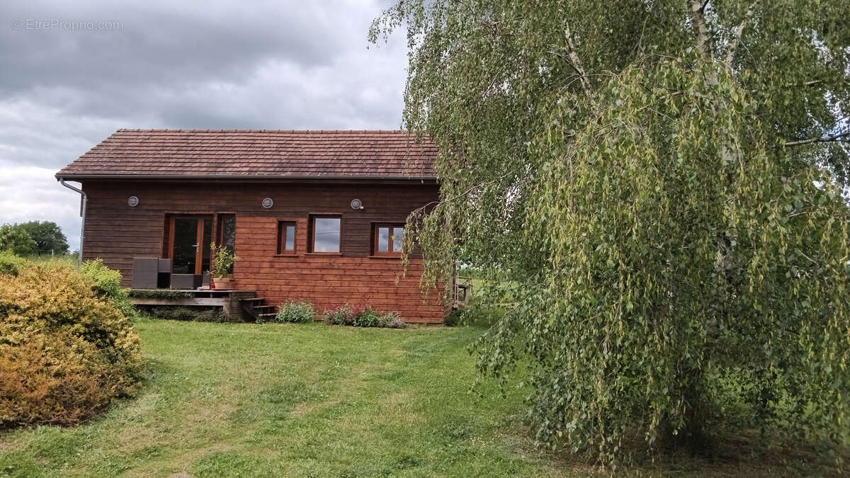 Maison 107 m² à Saint-Priest-Les-Fougeres  - photo 2