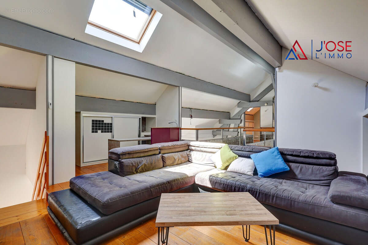Espace détente en mezzanine - Maison à TOUILLON