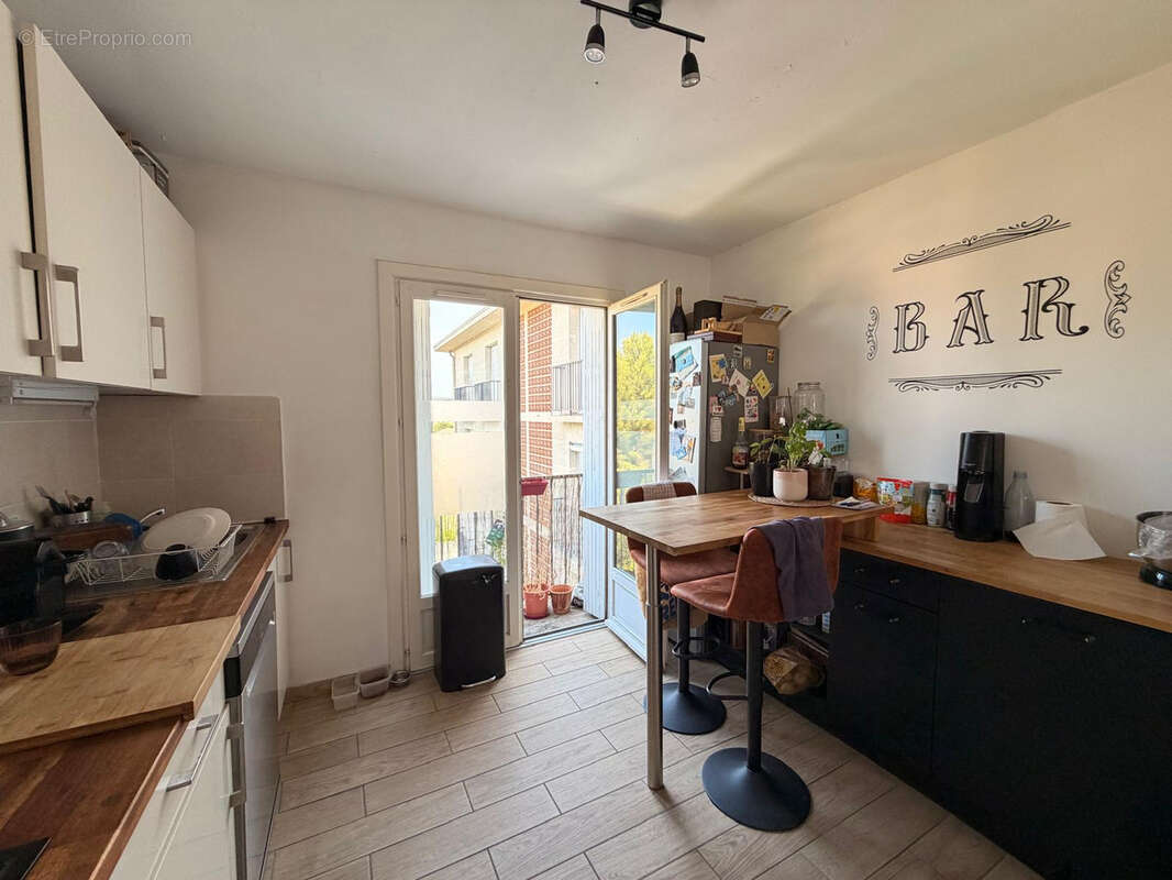 NIMES BEAUSOLEIL Appartement 5 pièces de 90 m2 avec cave et place de parking - photo 2