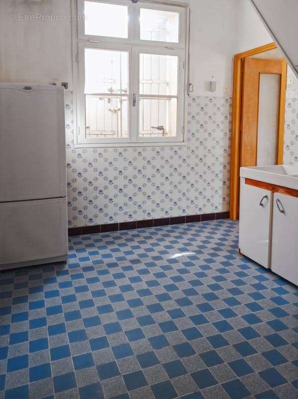 Maison à LAUDUN-L'ARDOISE