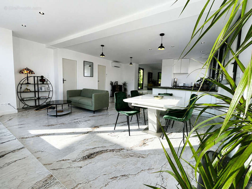 Quand le loft rencontre l'horizon. Un loft d'exception avec ascenseur, terrasse panoramique de 400 m² et vue sur l'Odet - photo 3