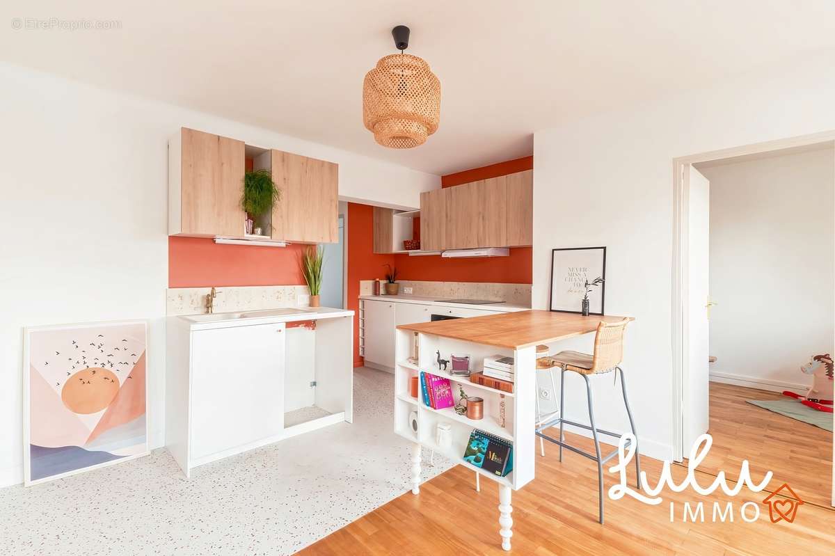 TASSIN - T4 65m2 avec balcon et deux caves  - photo 2