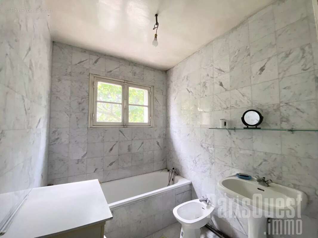 Maison à COURBEVOIE