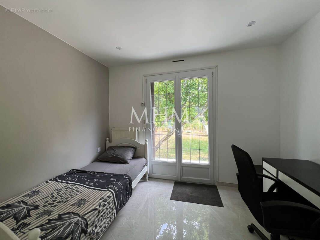 Plain-pied individuel 4 chambres et garage - photo 5