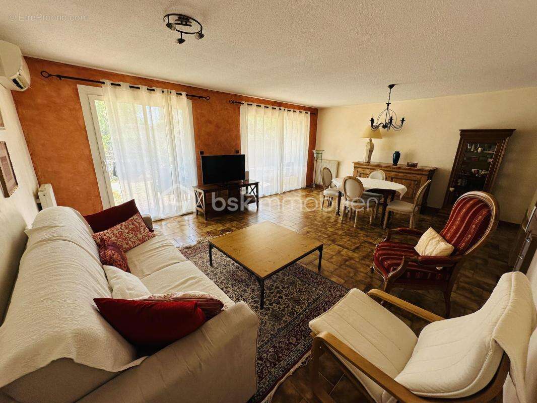 Appartement en rez de jardin avec garage + place de parking privative - photo 2