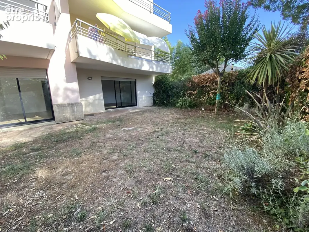 Appartement T5 avec jardin privatif, box et parking - photo 2