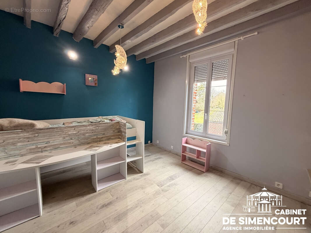 Maison à QUEVAUVILLERS