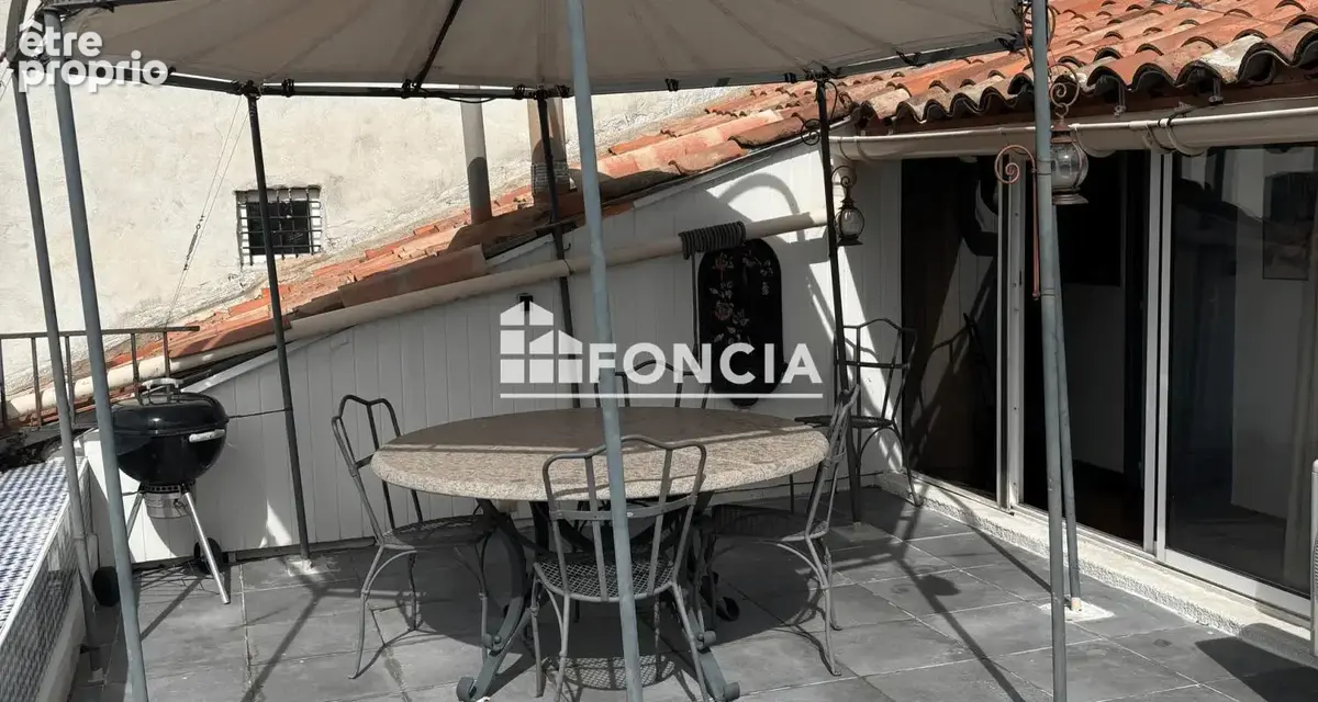 Alès Coeur de Ville - Duplex de caractère avec terrasse, au 3ème étage d'un immeuble ancien - photo 7
