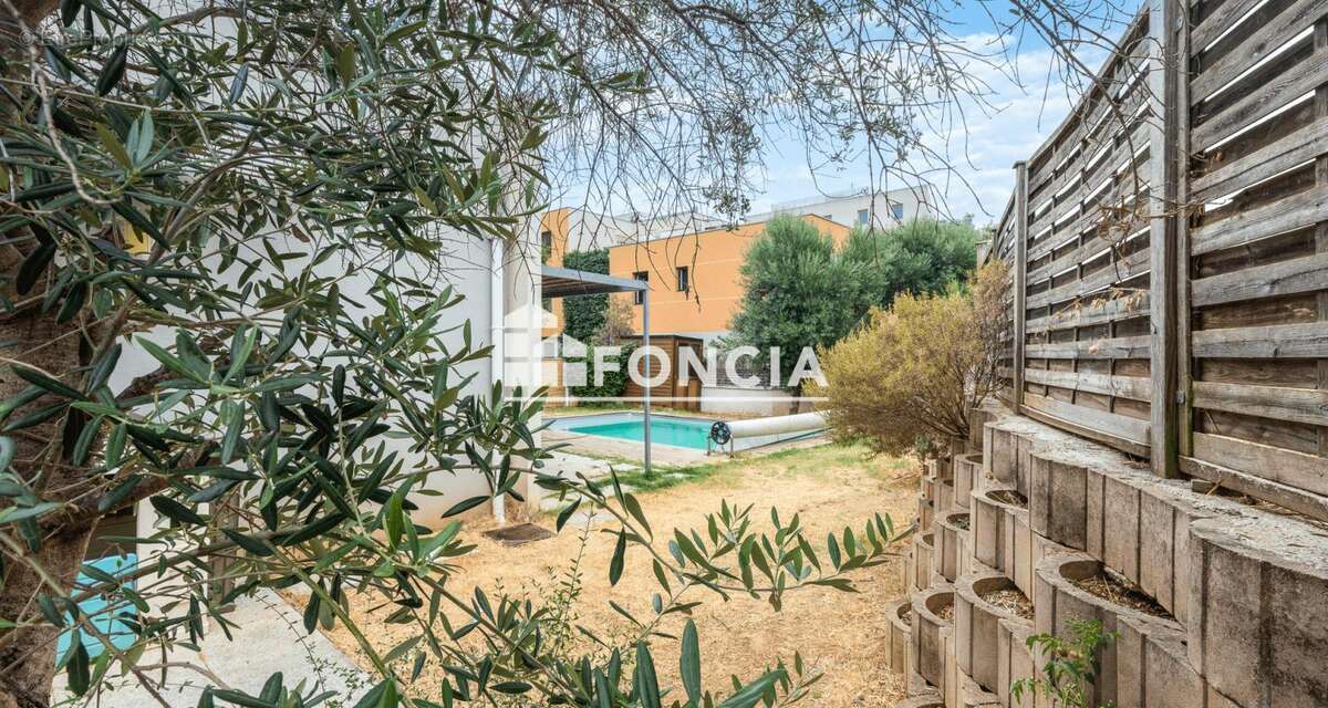Et si votre prochain appartement vous offrait les prestations d’une maison ? Jardin, terrasses et piscine privée vous attendent - photo 2