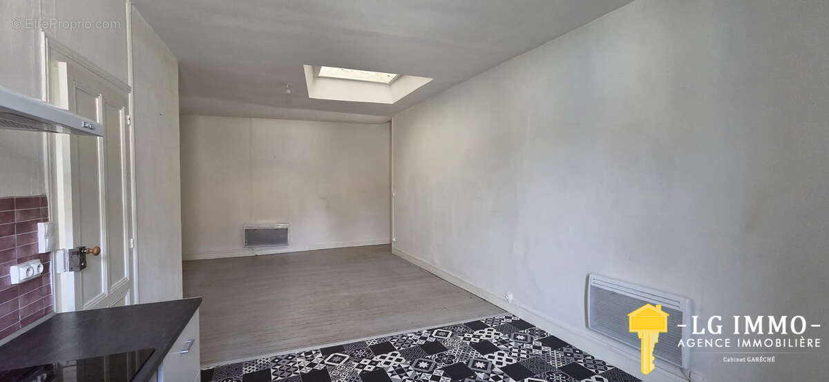 Appartement t3 + local commercial, centre bourg de mortagne - photo 2