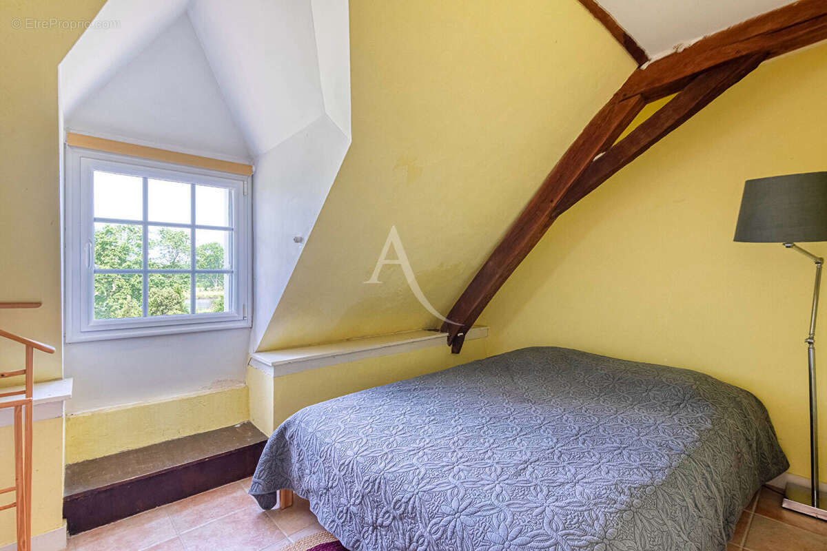 Maison de caractère à vendre à La Possonnière, implantée sur un magnifique terrain d'un hectare. - photo 9