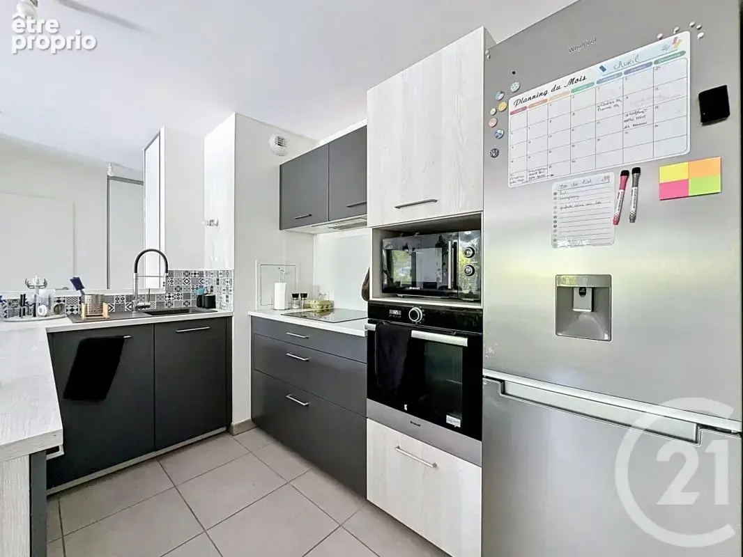 Appartement 60 m² à Saint-Priest  - photo 8