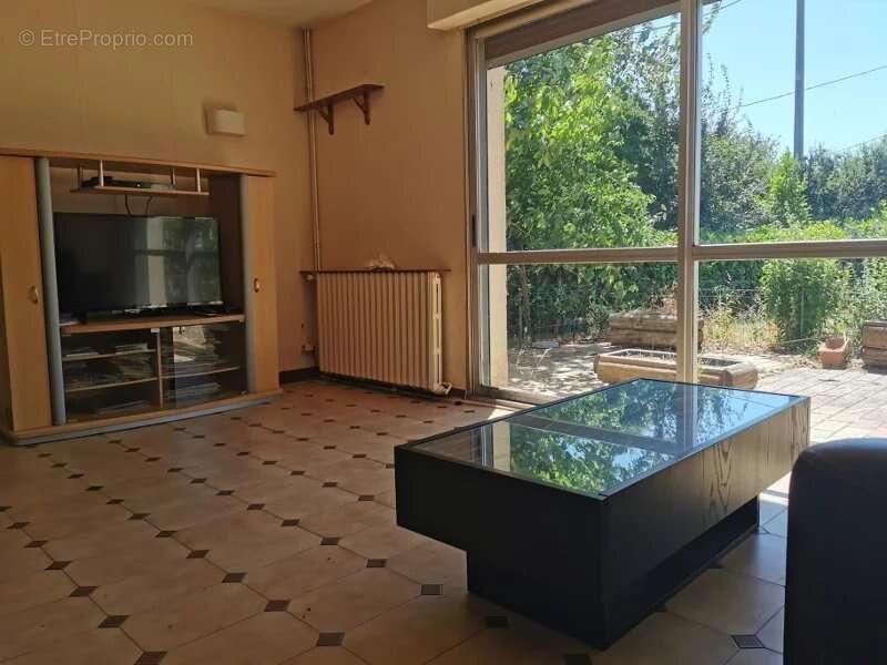 Maison T4 de plain pied avec garage et jardin - photo 4