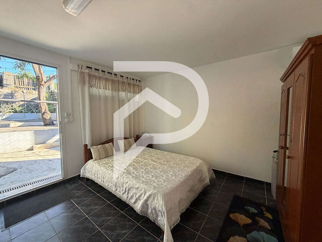 Un ensemble immobilier rare au coeur de Manapany-les-Bains - photo 5