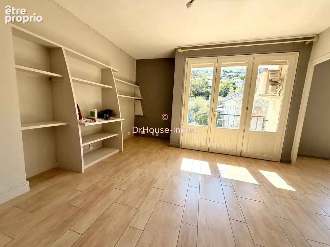 Appartement 4 pièces 67 m² à vendre à Tulle (19000) - photo 4