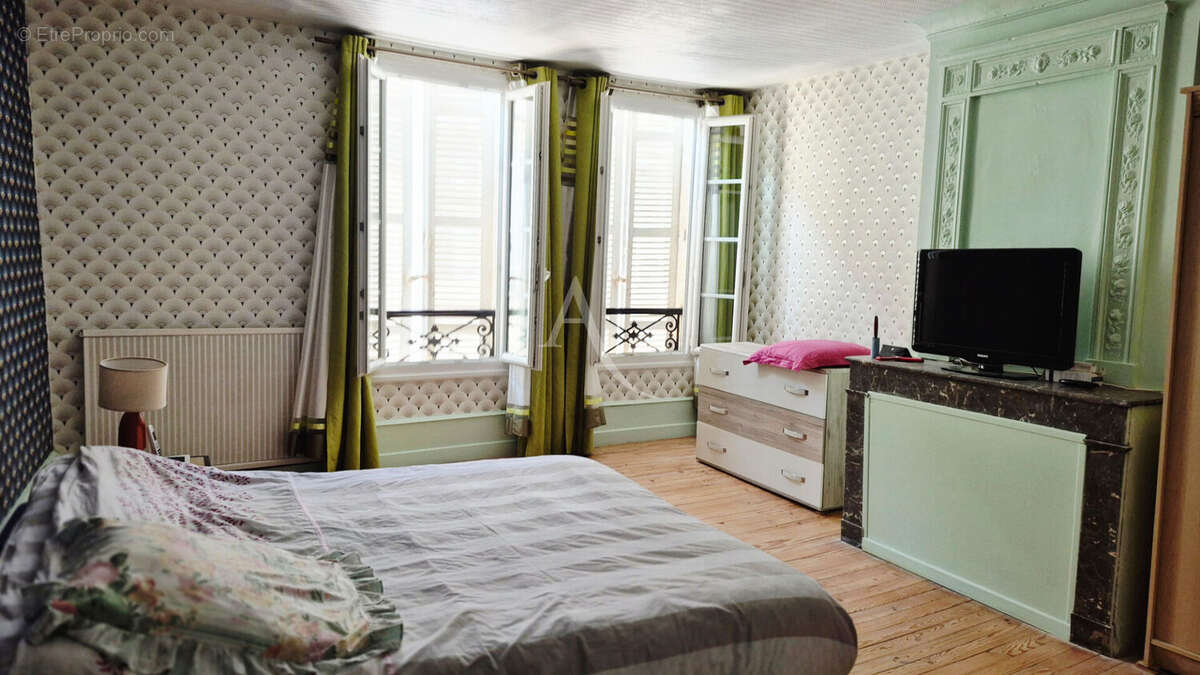 Maison coeur de ville à Saintes - photo 11