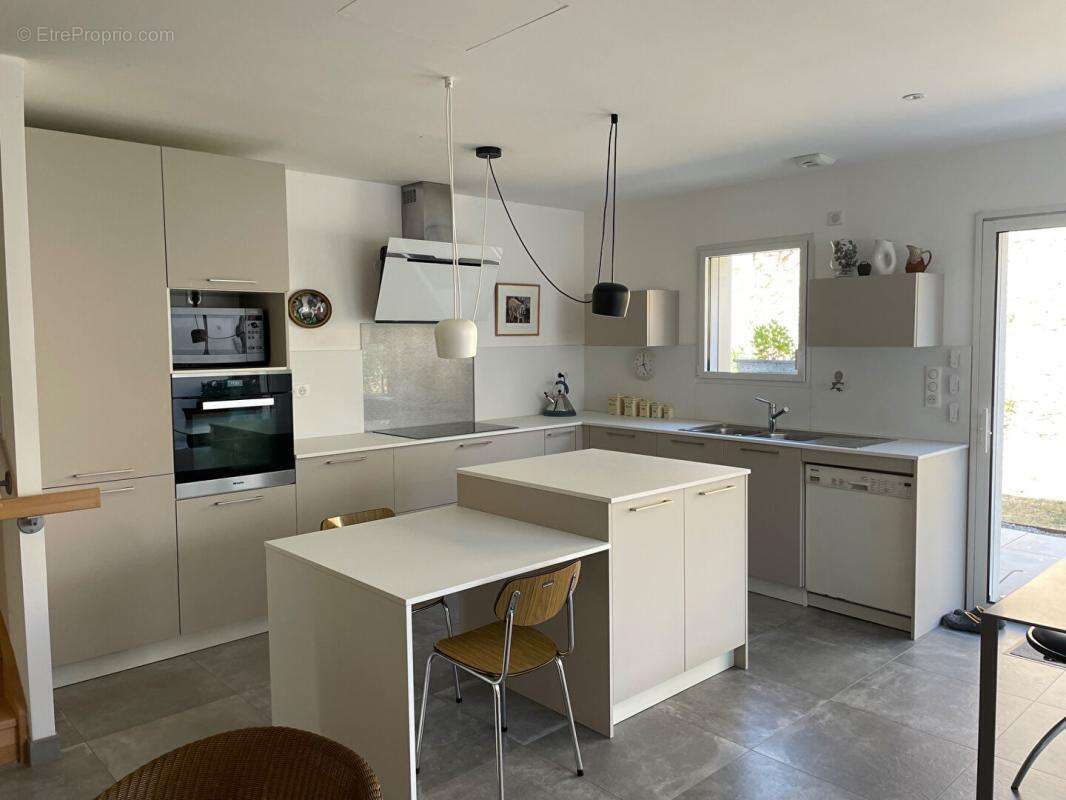 Maison récente 104 m2, 3 chambres, vie de plain-pied et garage 37 m2 à Paimboeuf - photo 2