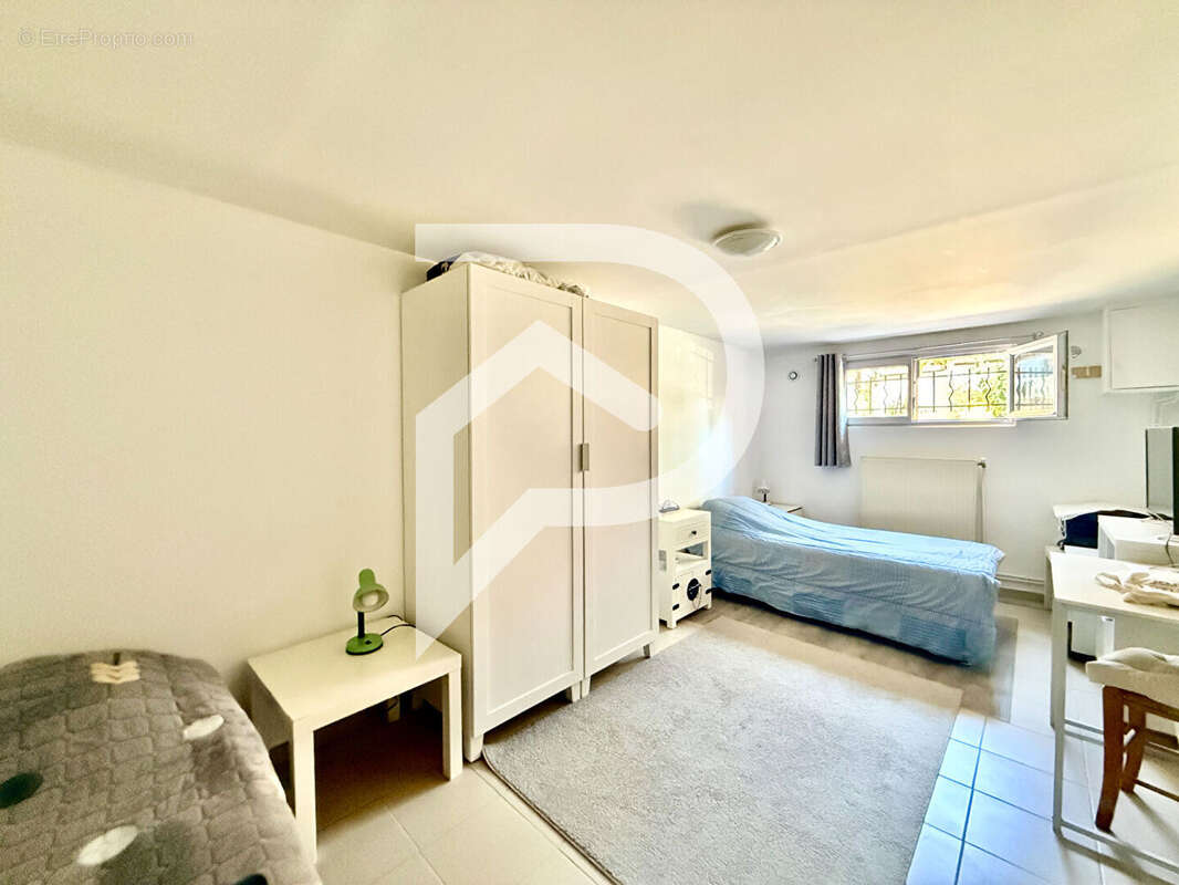 Maison Aulnay Sous Bois 7 pièce(s) 107.69 m2 - photo 11