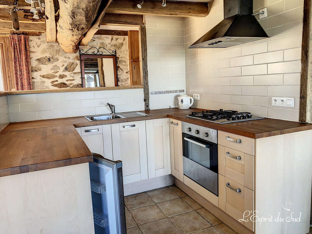 Maison à PREVINQUIERES