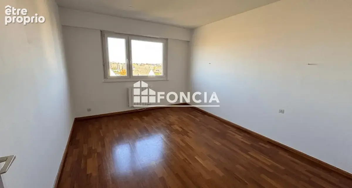 ERSTEIN Appartement traversant  88.33m2 avec vue dégagée, cave et garage - photo 4