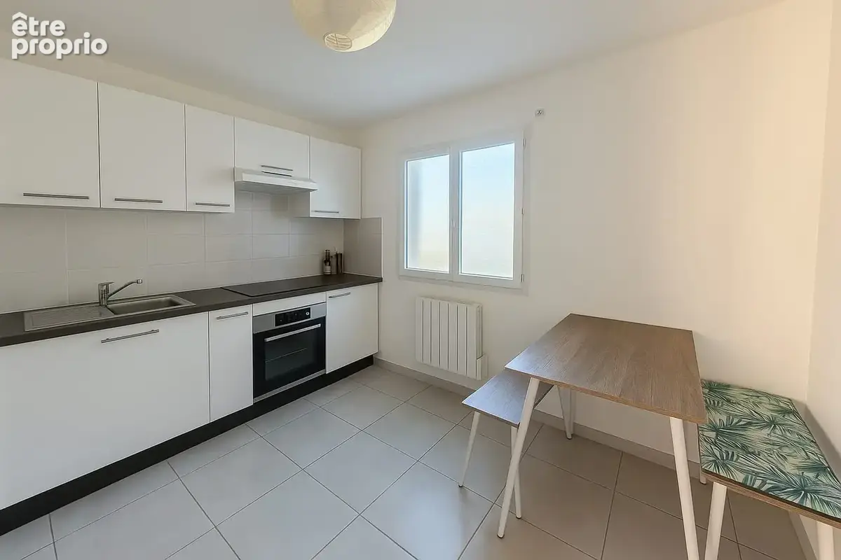 Appartement 4 pièces 97 m² à vendre à Genas (69740) - photo 2
