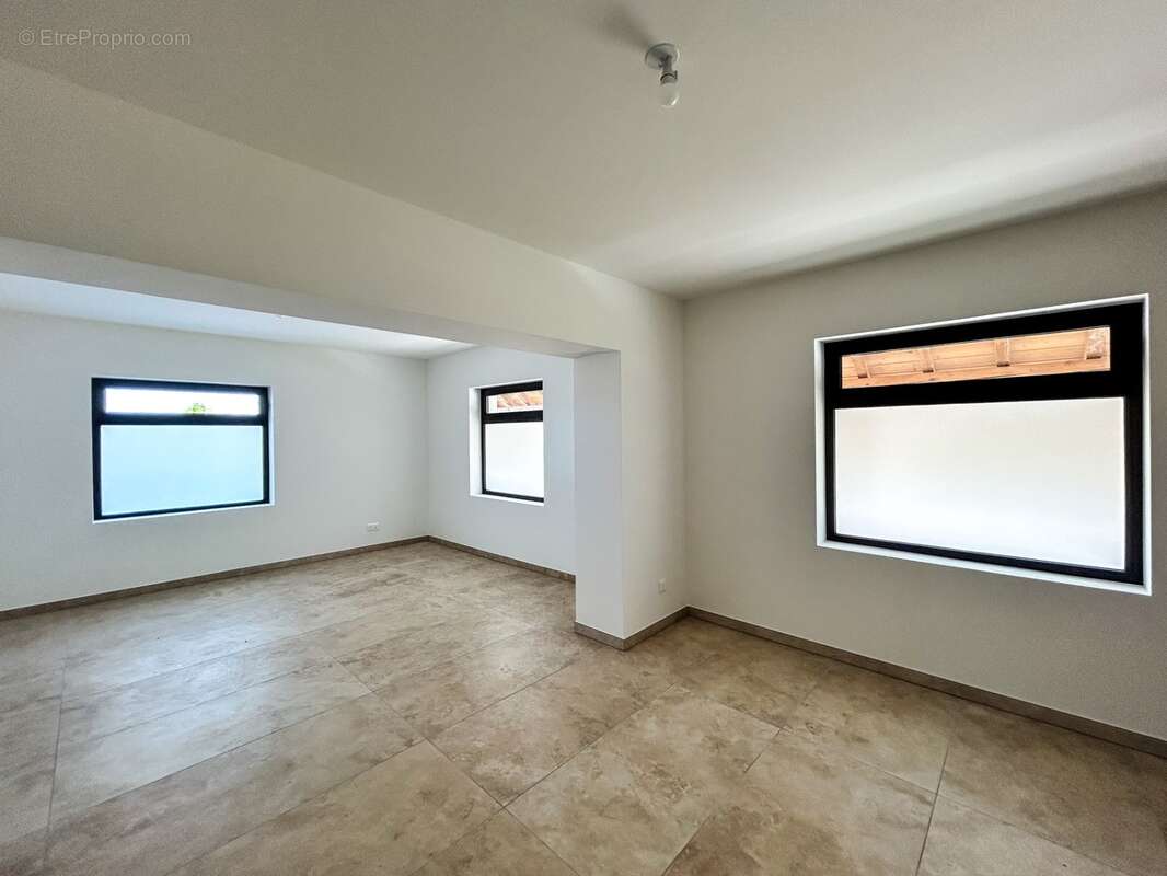 À vendre – Appartement T4 duplex traversant de charme dans une ancienne bâtisse rénovée à Viuz-en-Sallaz - photo 5