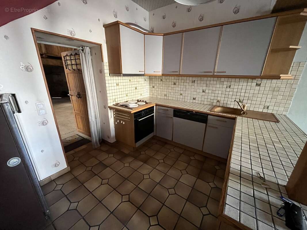 Maison à LE BREUIL-SUR-COUZE