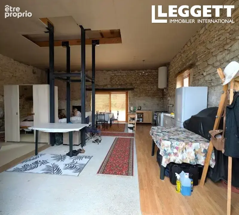 Maison en pierre de 70 m² avec combles aménageables – beau potentiel - photo 4