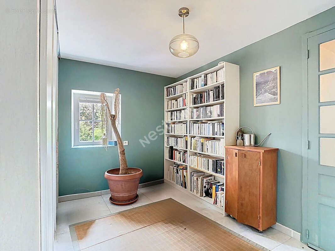 Venez découvrir cette magnifique maison en pierres apparentes, nichée dans un écrin de verdure, à seulement 5 km de l'axe Nantes - photo 11