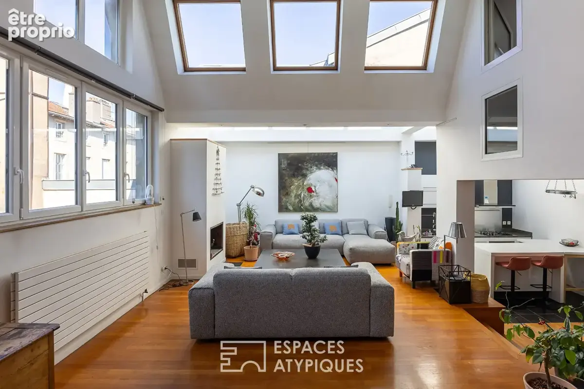 Loft baigné de lumière dans un ancien atelier en coeur de ville - photo 2