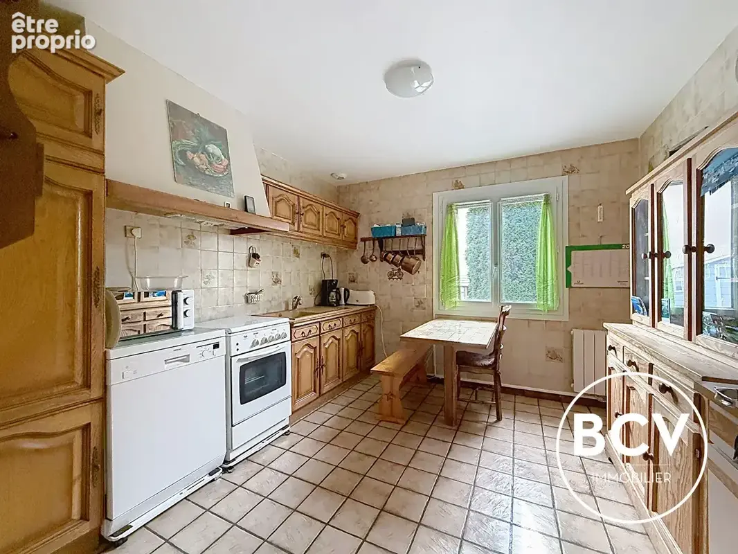 Maison familiale avec jardin et garage - photo 5