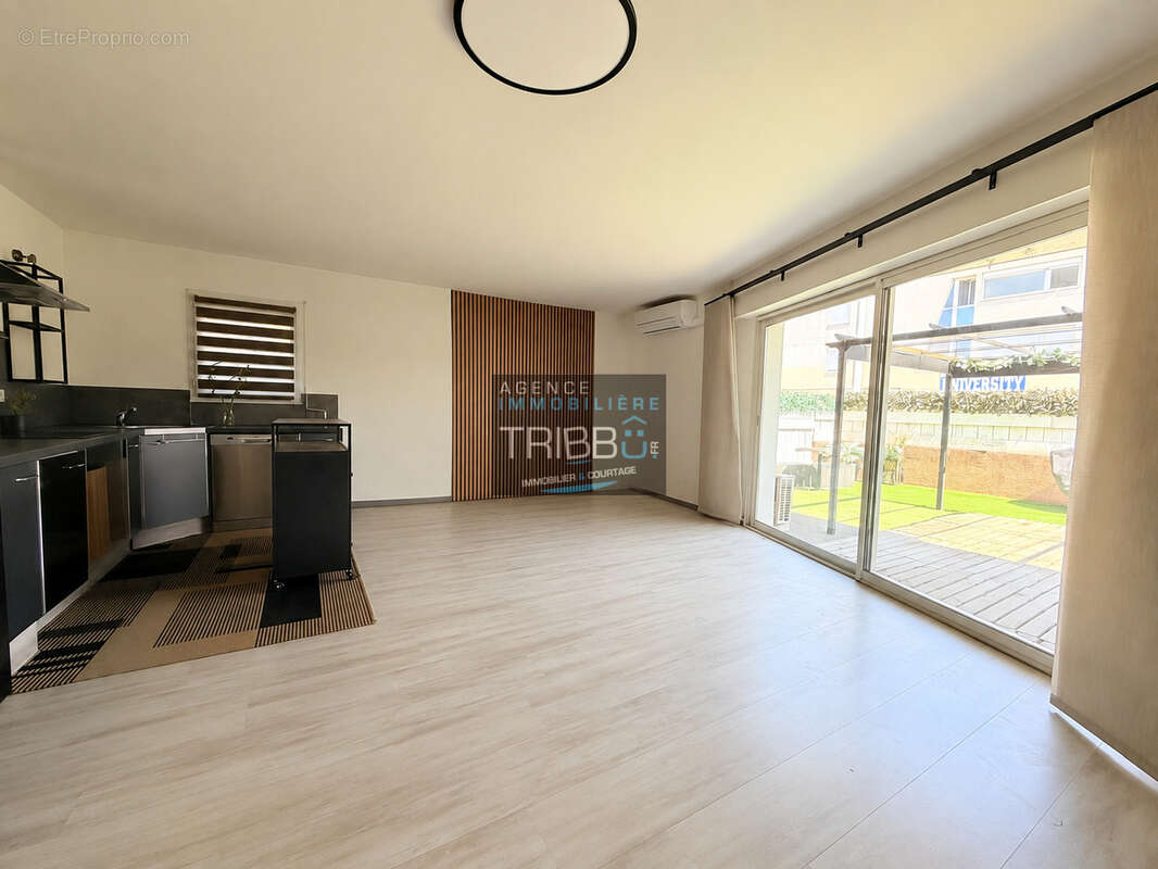 Appartement t2 de 50 m2 en rez de jardin avec grande terrasse et stationnement - perpignan - universite - photo 2