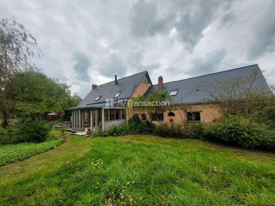 Maison à LOUVIGNE
