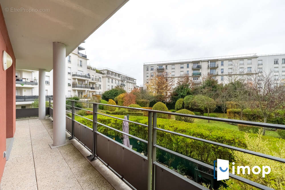 T3 avec terrasse 16 m² et double parking sécurisé - photo 13