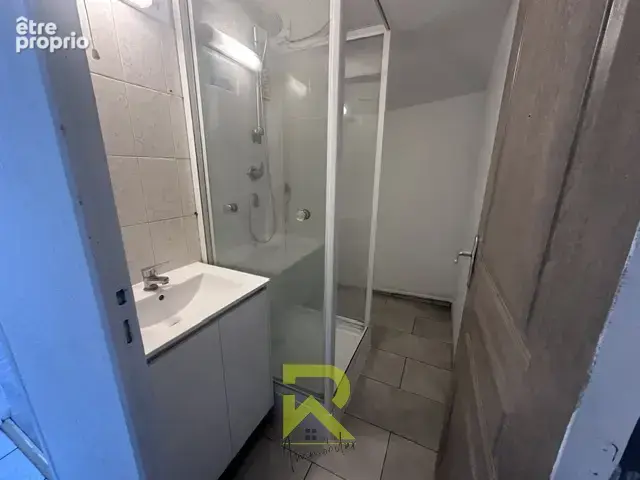 Appartement dans immeuble - photo 7