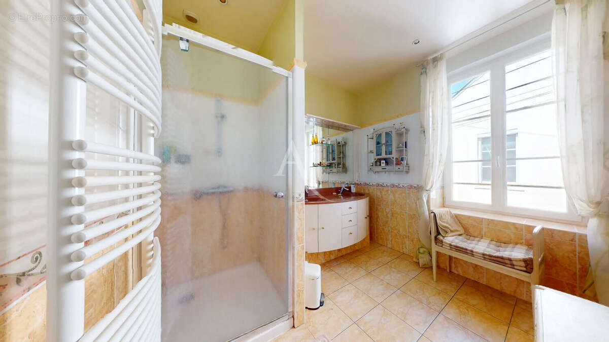 Maison familiale 8 pièces - 206 m2 - Centre ville de Neuville-aux-bois - photo 11