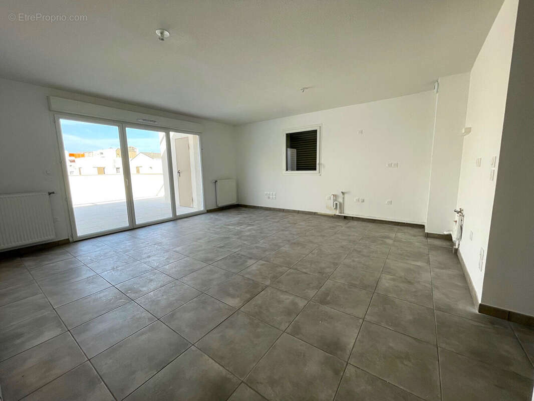 Appartement à BEAUZELLE