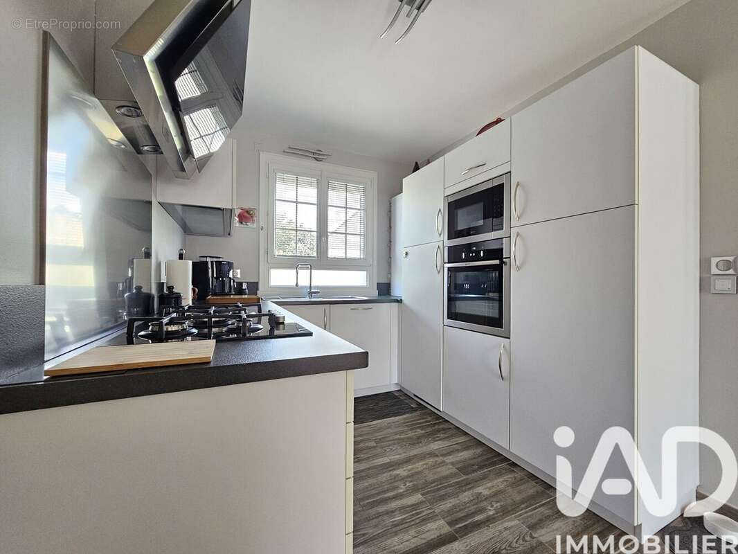 Maison 142 m² à Coulaines  - photo 3