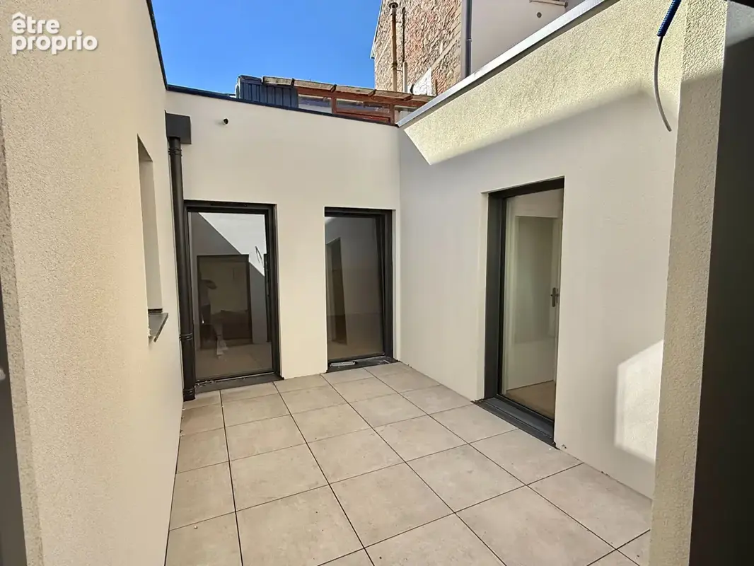 VICHY / Maison de ville type loft neuf de près de 200 m², prestations haut de gamme ! - photo 8
