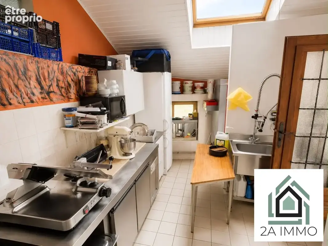 Maison 9 pièces 152 m² à vendre à Bourg-Lastic (63760) - photo 7