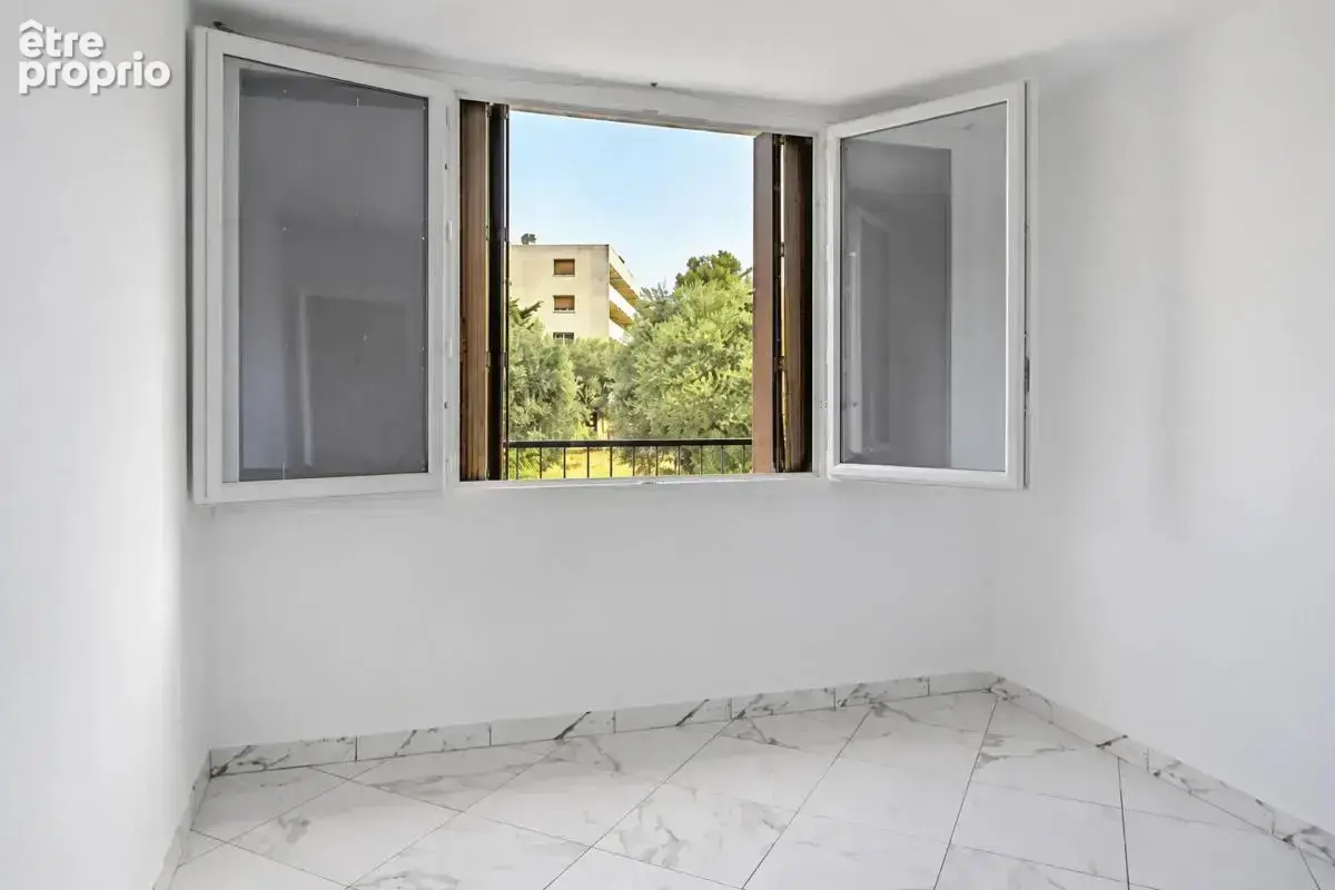 Bel appartement T3 avec loggia, cave et parking - photo 7