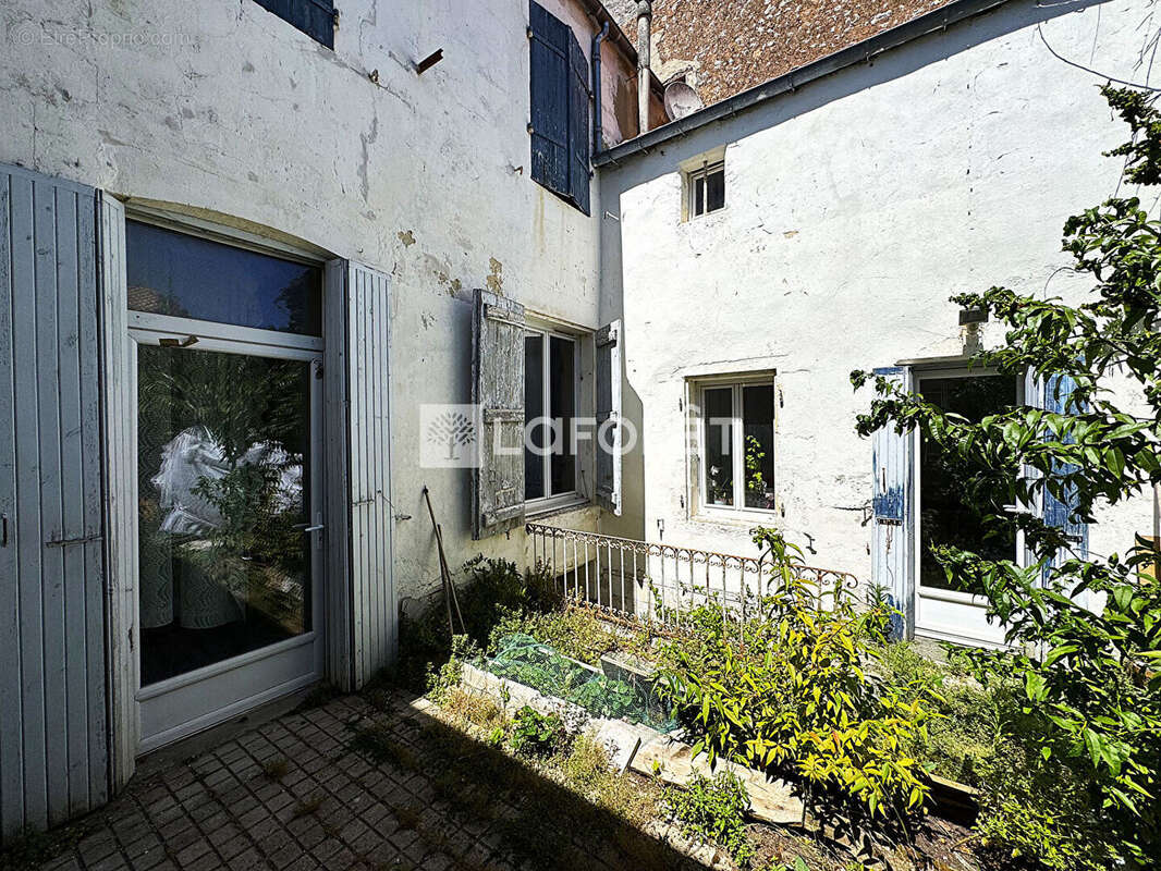 Maison à MARENNES