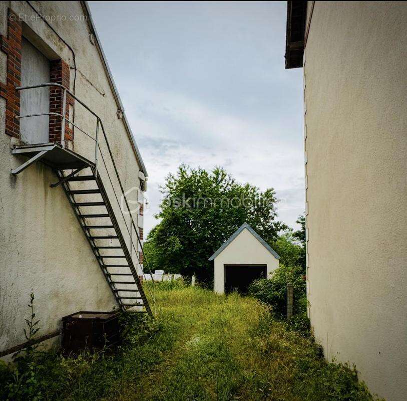 Maison de village avec jardin et garage : un fort potentiel à petit prix - photo 3