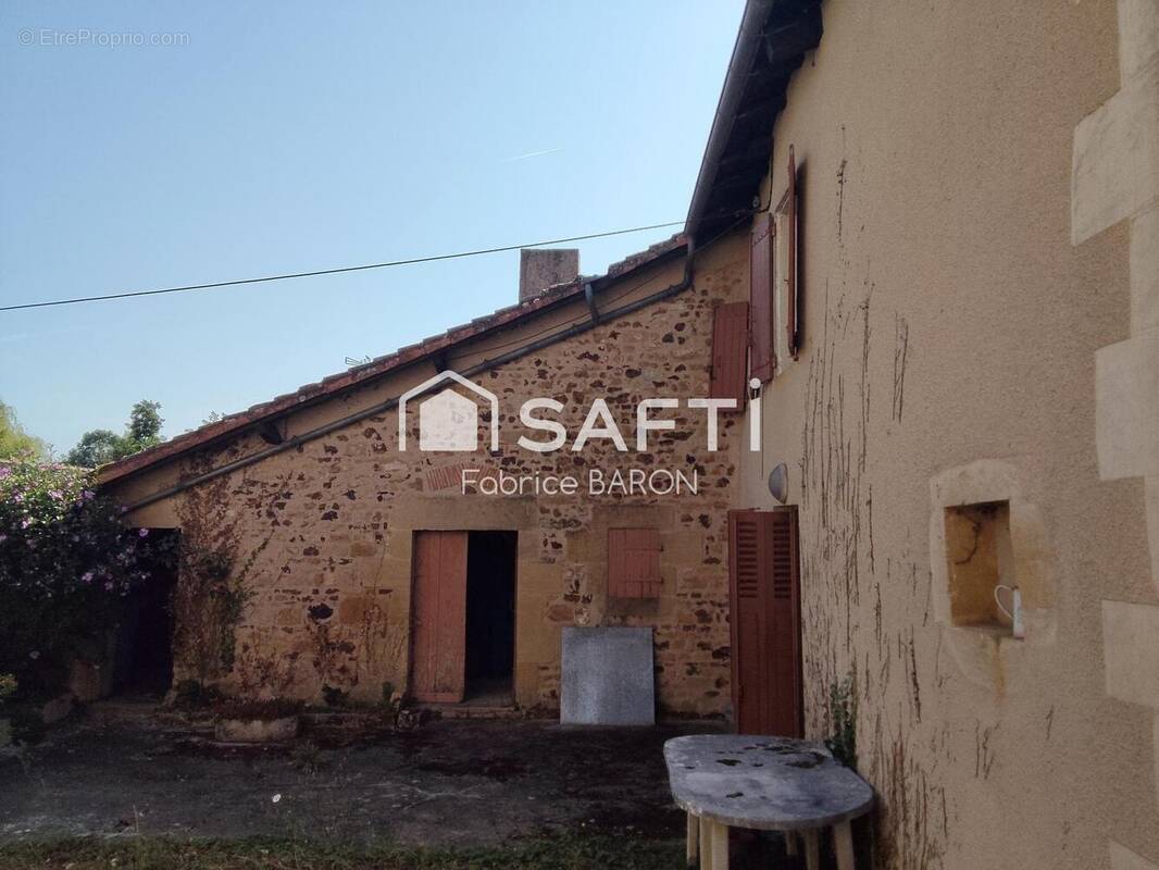 Photo 1 - Maison à PRESSAC