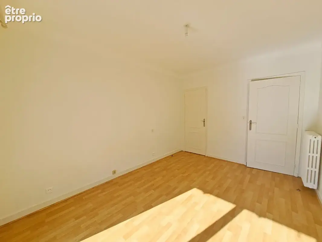 Spacieux appartement T4 de 100,97 m² avec balcon, cave et parking - photo 10